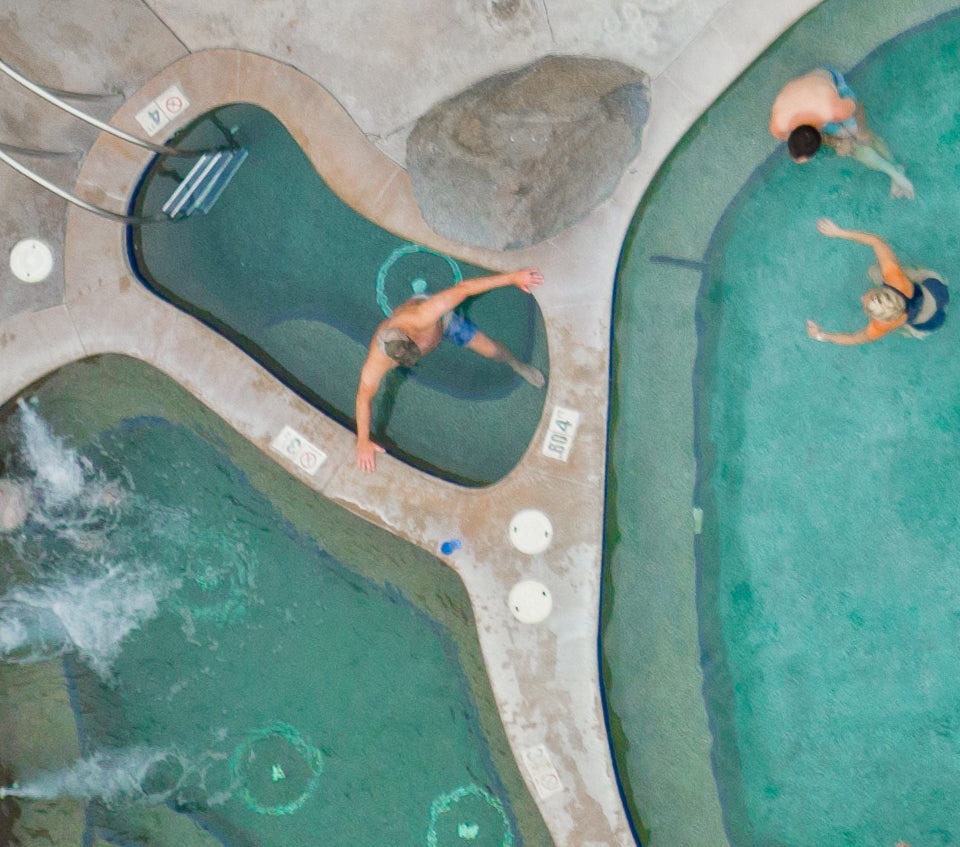 Overhead view of tiled hot pools with soakers seen from above